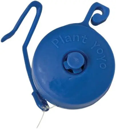 Close-up of blue Grow1 retractable yo-yo plant support with stopper